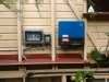 grid_feed_inverter_external_mount_on_timber_wall